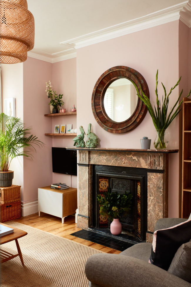 Interiors of refurbished south london appartment, living room with pink walls