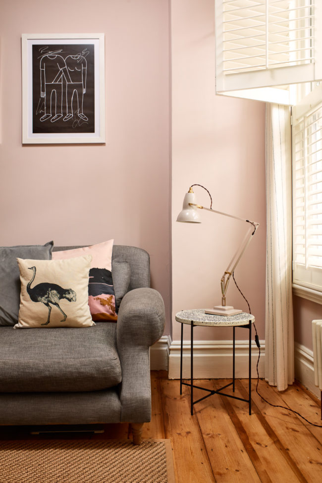 Interiors of refurbished south london appartment, living room with pink walls