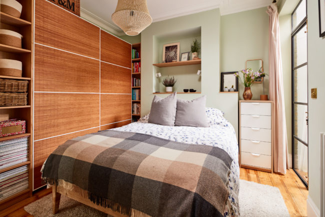 Interiors of refurbished south london appartment, bedroom with green walls