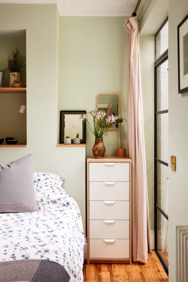 Interiors of refurbished south london appartment, bedroom with green walls