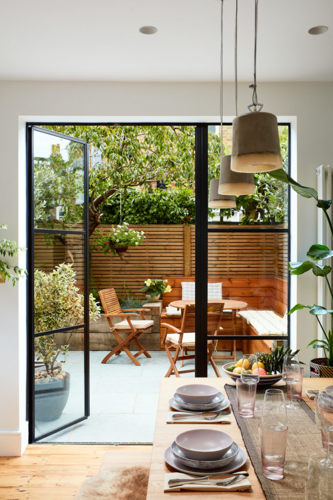 Interiors of refurbished south london appartment, dining area and crital windows