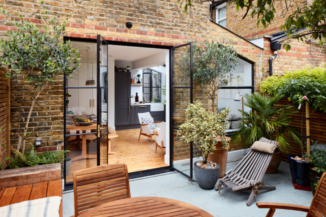 Interiors of refurbished south london appartment, exterior courtyard space